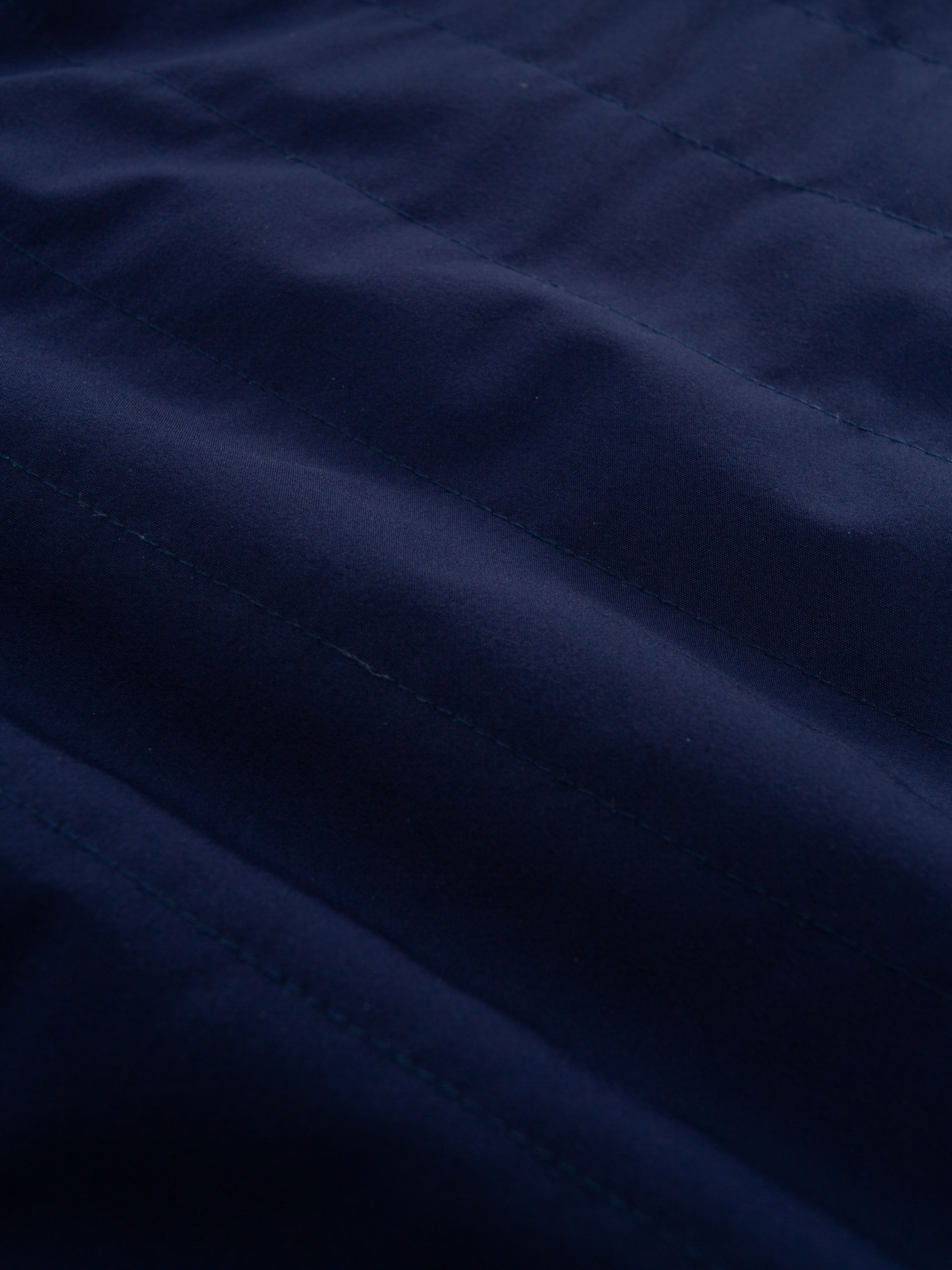 Kongsvinger Vest Reversible Blue Ink/Chili